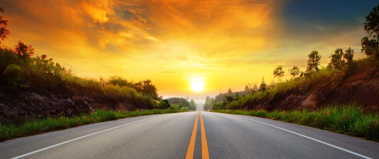 Image of a Sunset over a Country Road