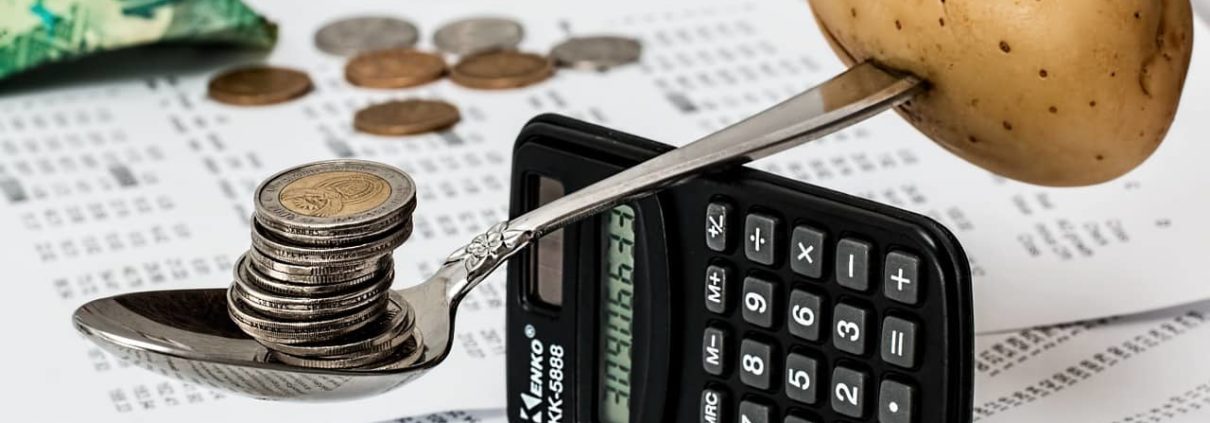 image of calculator balancing items, Secure Business Finance