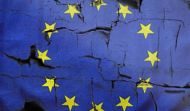 image showing crumbling EU flag, Brexit impacted the UK economy